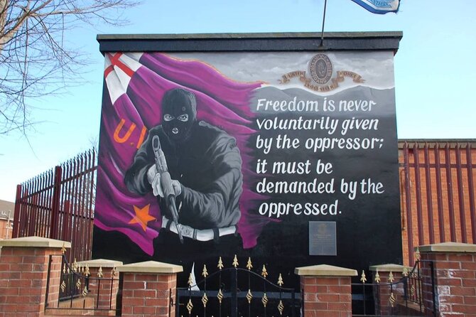 2 Hours Republican & Loyalist Mural Black Taxi Tour from Belfast - Stop 3: Falls Road Library area, photo stops and the H block statue