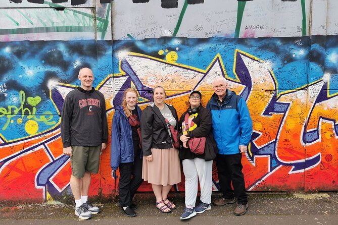 Belfast's Political Mural Taxi Tour - Stop 2: International Mural Wall on Divis Street for the best photo beats