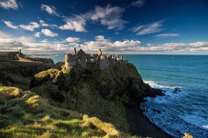 Experience the Antrim Coast and the Land of Giants - Private Tour - Dunluce Castle ruins on the cliff: imagining life above the sea