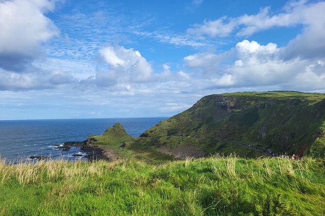 Five Star Giant's Causeway & Belfast Luxury Private Excursion. - Belfast in the afternoon: murals, Peace Walls, and Titanic shipyard context