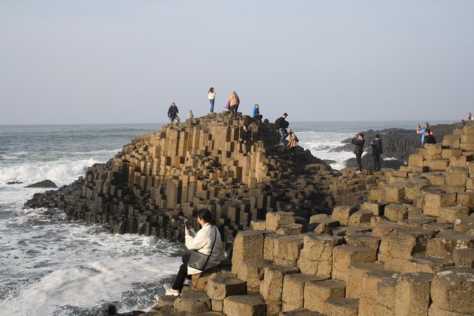 Giant's Causeway Day Tour and Belfast City Tour 1 Day Pass - Carrickfergus Castle and Carnlough Harbour: Quick Shots, Real Places