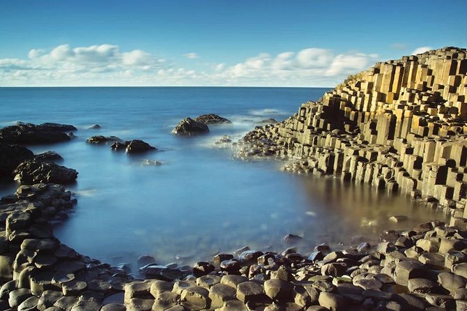 Giant's Causeway Day Tour and Belfast City Tour 1 Day Pass - Dunluce Castle Photo Stop: A View You’ll Remember