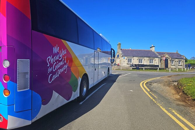 Giants Causeway & Castles Tour from Belfast: Guided tour - Old Bushmills and Dunluce Castle: Cliffside Drama