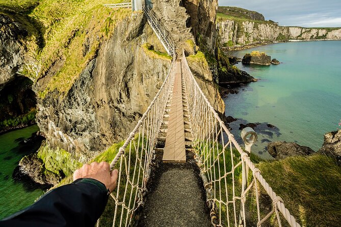 Luxury Giants Causeway Tour in Mercedes + FREE Belfast Mural Tour - Dunluce Castle and Dunseverick: ruins, sea views, and legend