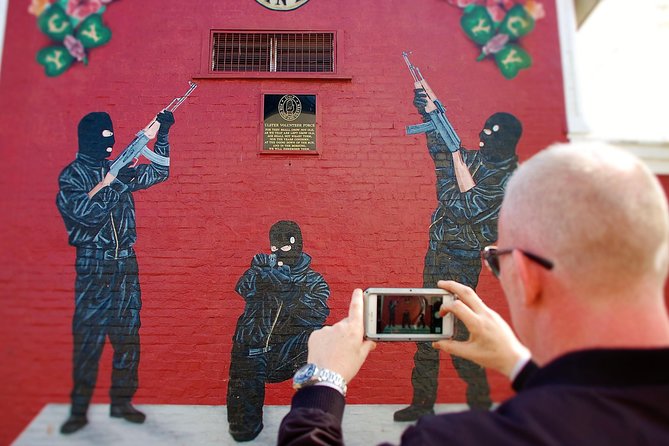 Original Private Belfast Troubles and Peace Cab/Taxi Tour 2 Hours - Stop 1: Divis Street International Mural Wall, where politics goes global
