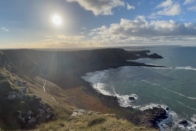 Private Belfast Mural & Giant's Causeway Tour from Belfast (2 in 1) - Ballintoy Harbour and The Dark Hedges: Game of Thrones stops that feel real
