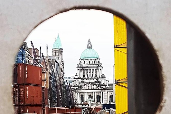 The Real Eclectic Belfast City Walking Tour/Experience. - Cathedral-area murals and reconciliation themes, ending near Anne’s statue